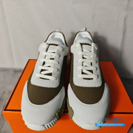Hermès Bouncing Sneakers in a khaki or brown technical mesh and white suede colorway