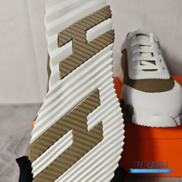 QC Hermès Bouncing Sneakers in a khaki or brown technical mesh and white suede colorway