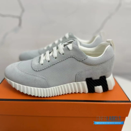 QC Hermès Bouncing Sneakers in a grey