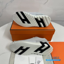 QC Hermès Bouncing Sneakers in a grey