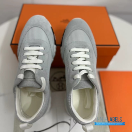 QC Hermès Bouncing Sneakers in a grey