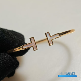 QC Tiffany & Co. T Wire bracelets in 18k yellow gold with mother-of-pearl inlay