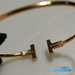 QC Tiffany & Co. T Wire bracelets in 18k yellow gold with mother-of-pearl inlay