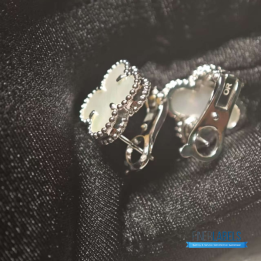 VCA Vintage Alhambra earrings featuring mother-of-pearl in 18K white gold