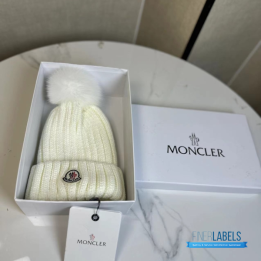 Moncler Ribbed Wool Beanie in White with a fur Pom Pom