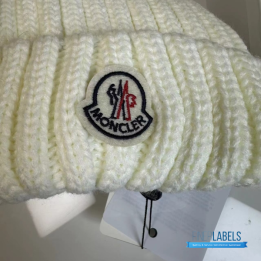 Moncler Ribbed Wool Beanie in White with a fur Pom Pom