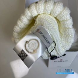 Moncler Ribbed Wool Beanie in White with a fur Pom Pom