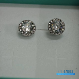 Tiffany & Co. Sterling Silver Moissanite Stud Earrings featuring a classic halo design.