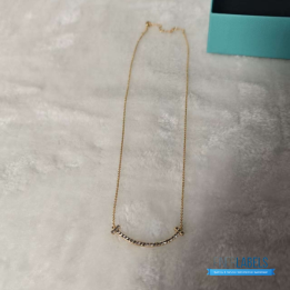QC Tiffany & Co. T Smile Diamond Pendant Necklace