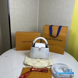 Louis Vuitton Capucines Croco press