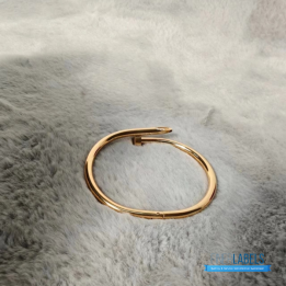 QC Cartier Juste un Clou Bracelet in a rose gold nail design