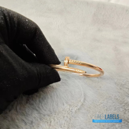 QC Cartier Juste un Clou Bracelet in a rose gold nail design