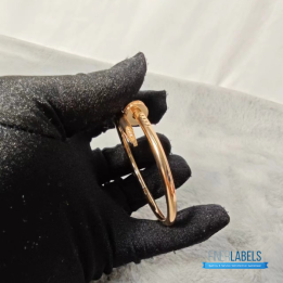 QC Cartier Juste un Clou Bracelet in a rose gold nail design