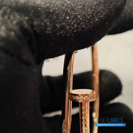 QC Cartier Juste un Clou Bracelet in a rose gold nail design