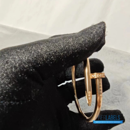 QC Cartier Juste un Clou Bracelet in a rose gold nail design