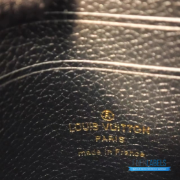 Louis Vuitton Empreinte Double Zip Pochette Bag
