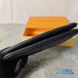 Louis Vuitton Empreinte Double Zip Pochette Bag