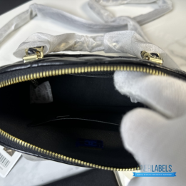 Chanel Shiny Lambskin Quilted Coco Clutch with Chain in black