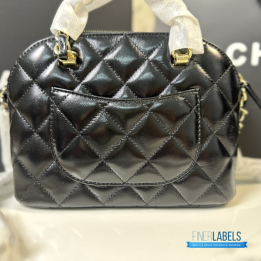 Chanel Shiny Lambskin Quilted Coco Clutch with Chain in black