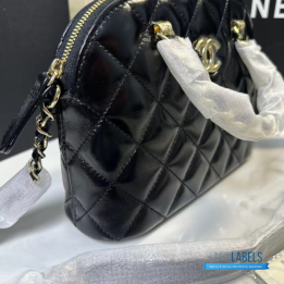 Chanel Shiny Lambskin Quilted Coco Clutch with Chain in black