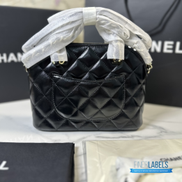 Chanel Shiny Lambskin Quilted Coco Clutch with Chain in black