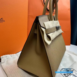 QC Hermès Birkin 25 in a light beige shade