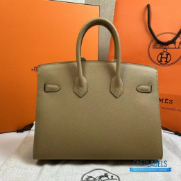 QC Hermès Birkin 25 in a light beige shade