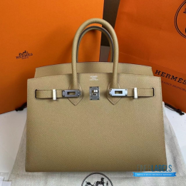 QC Hermès Birkin 25 in a light beige shade
