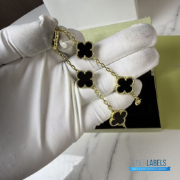 VCA Vintage Alhambra 5-motif bracelet in yellow gold featuring black onyx clover motifs