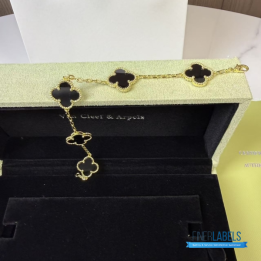 VCA Vintage Alhambra 5-motif bracelet in yellow gold featuring black onyx clover motifs