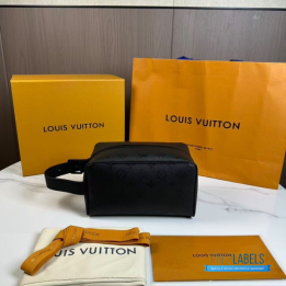 QC LV Locker Dopp Kit crafted in a dark canvas with an embossed tonal monogram pattern