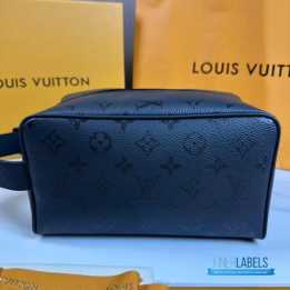 QC LV Locker Dopp Kit crafted in a dark canvas with an embossed tonal monogram pattern