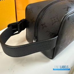 QC LV Locker Dopp Kit crafted in a dark canvas with an embossed tonal monogram pattern