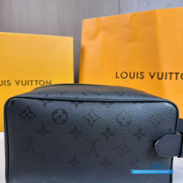 QC LV Locker Dopp Kit crafted in a dark canvas with an embossed tonal monogram pattern