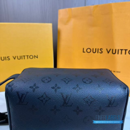 QC LV Locker Dopp Kit crafted in a dark canvas with an embossed tonal monogram pattern