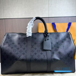 QC LV Keepall Bandoulière travel bag featuring a tone-on-tone Monogram canvas