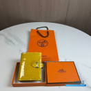 QC Hermès Bearn Compact wallet crafted in a glossy yellow (such as Jaune Ambre or Mimosa) alligator leather