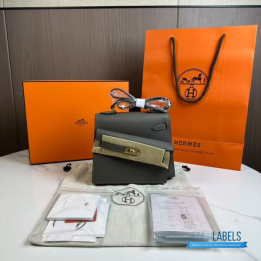 QC Hermès Kelly 20 cm Désordre handbag in a grey shade