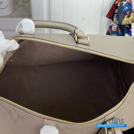 LV Keepall Bandoulière 45 (Tourterelle Monogram Empreinte Giant Leather)