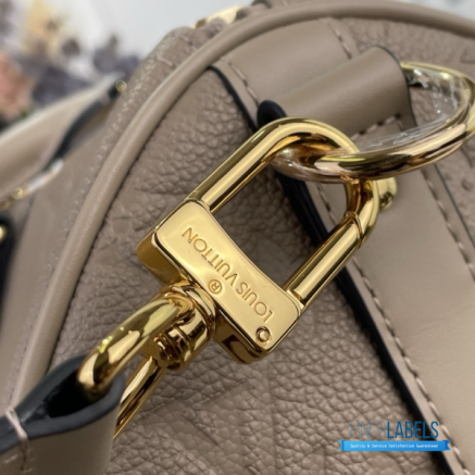 LV Keepall Bandoulière 45 (Tourterelle Monogram Empreinte Giant Leather)