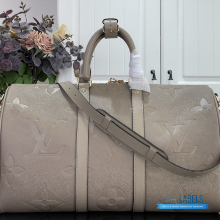 LV Keepall Bandoulière 45 (Tourterelle Monogram Empreinte Giant Leather)