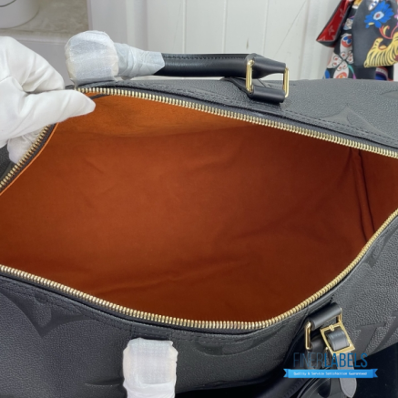 LV Keepall Bandoulière 45 (Black Monogram Empreinte Giant Leather)