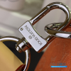 LV Keepall Bandoulière 50 Monogram Heritage (Caramel Orange Monogram Coated Canvas)
