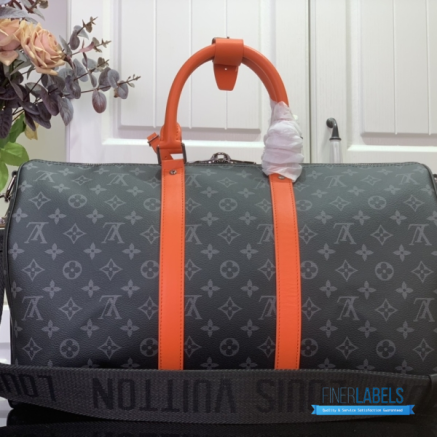 Louis Vuitton Keepall Bandoulière 45 (Monogram Eclipse Canvas / Sunrise Orange Leather)