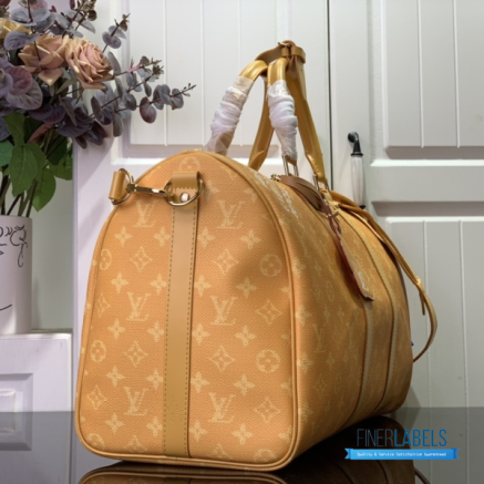 LV Keepall Bandoulière 45 (Safran Yellow Monogram Heritage Coated Canvas)