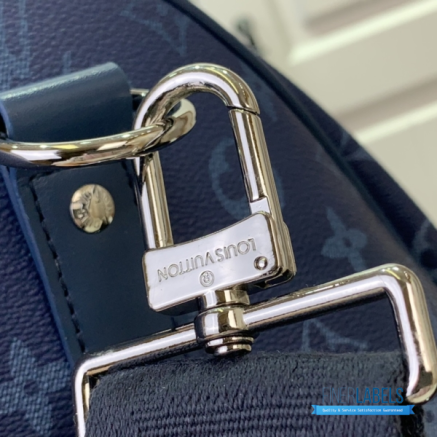 LV Keepall Bandoulière 50 (Blue Monogram Heritage Coated Canvas)