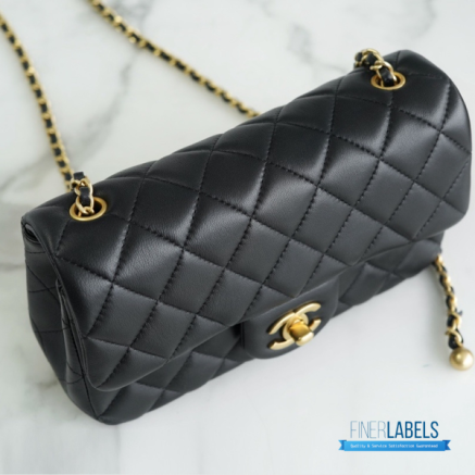 CHANEL Mini Square Pearl Crush Flap Bag (Black Quilted Lambskin & Aged Gold-Tone Hardware)