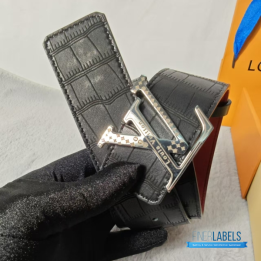 QC Louis Vuitton Reversible Belt featuring a textured black strap and red lining