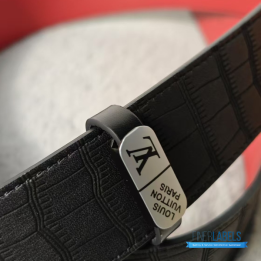 QC Louis Vuitton Reversible Belt featuring a textured black strap and red lining