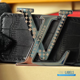 QC Louis Vuitton Reversible Belt featuring a textured black strap and red lining